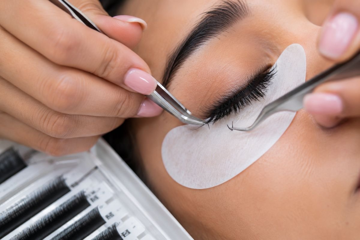 Eyelash extension course near me - student practicing lash isolation and application at Krazia Academy Noida Sector-18